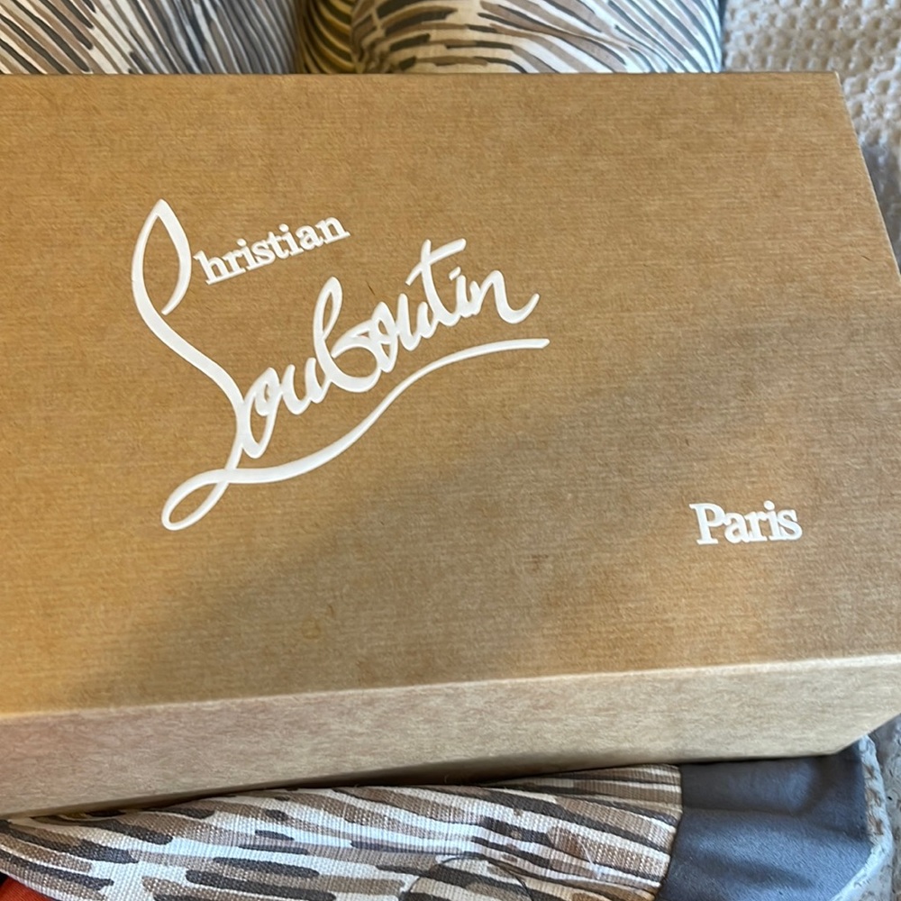 White Christian Louboutin‘s
